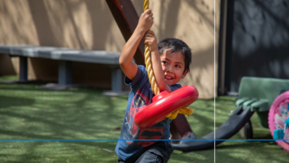 Child plays on a playground