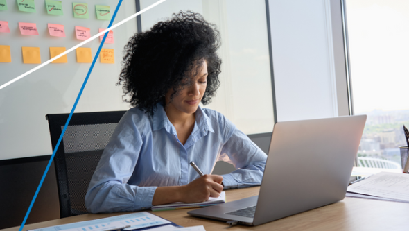 Woman working at a laptop