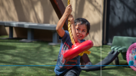 Child plays on a playground