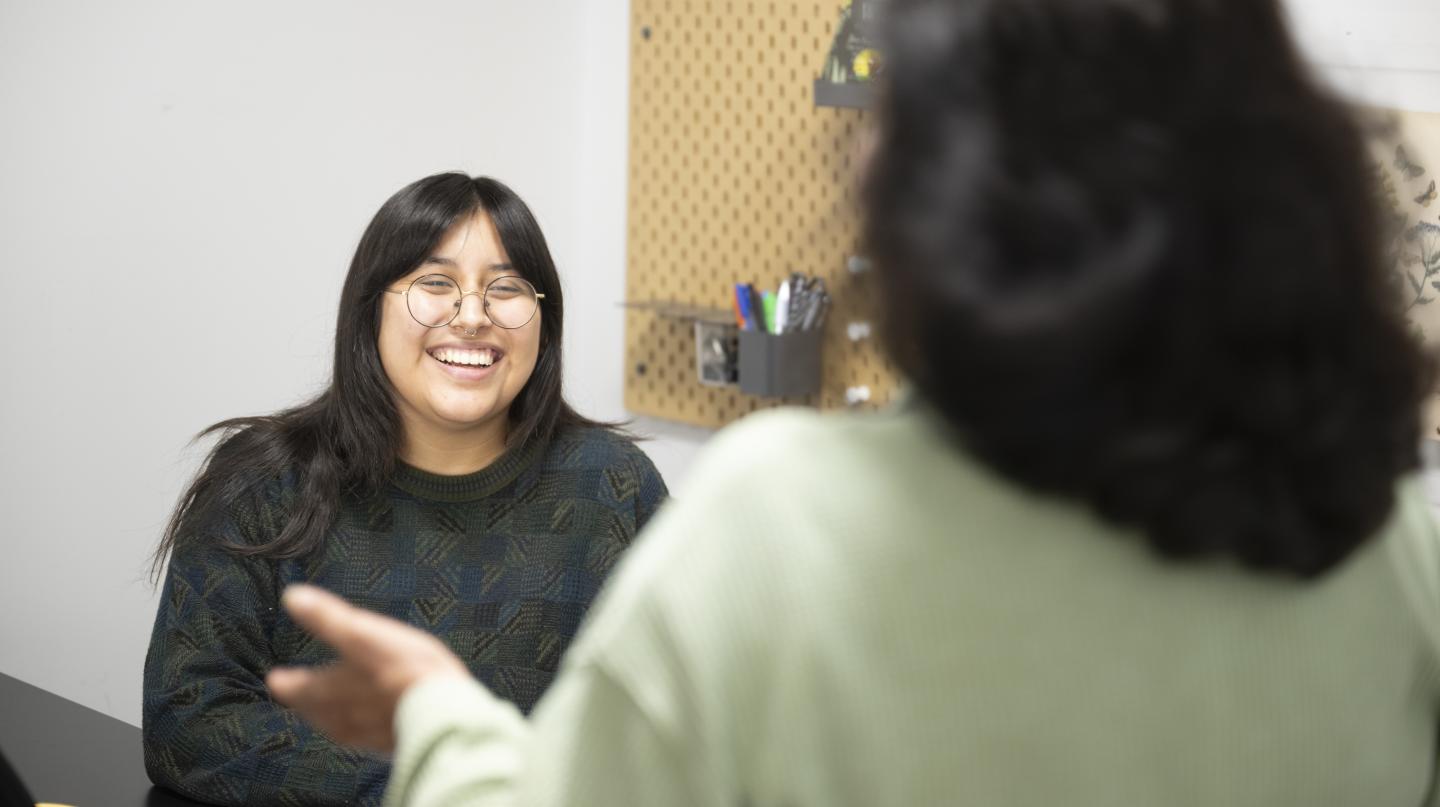 Orange County Conservation Corps associate speaking with a client